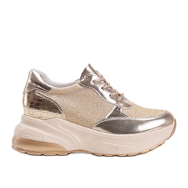 Goldene Sneaker mit klobiger Amy-Sohle
