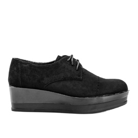 Schwarze Wildlederschuhe auf hoher Elisabeth-Sohle