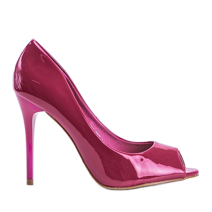 Pinke Pumps lackiert auf einem Luke-Absatz rosa