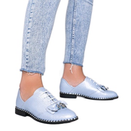 Blaue glänzende Schuhe mit einer Lost Stars Schleife