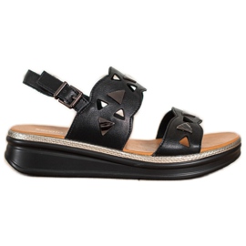 Schwarze Sandalen auf der Sergio Leone-Plattform