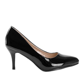 Schwarze Pumps mit roter Sohle