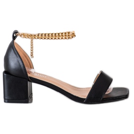 Seastar Sandalen mit dekorativer Kette schwarz golden