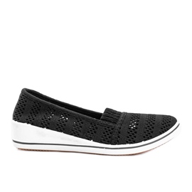 Schwarze Slip On Sneakers auf dem SoHo Wedge