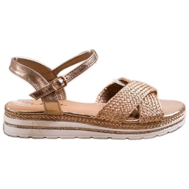 Mannika Goldene Sandalen auf der Plattform