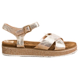 Bestelle Sandalen auf der Glitzerplattform golden