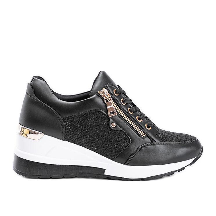 Schwarze glänzende Sneakers auf dem Keilabsatz The Moment