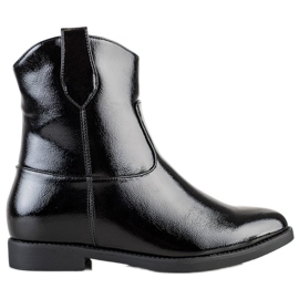 J. Star Schwarze Cowgirls auf einem Keil