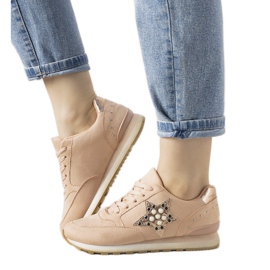 Rosa Sport-Sneaker verziert mit Ruler-Nieten