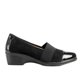Schwarze Schuhe am Bellissima Wedge
