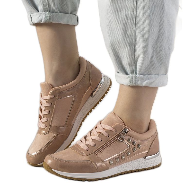 Rosa Sport-Sneakers verziert mit Daphne-Nieten