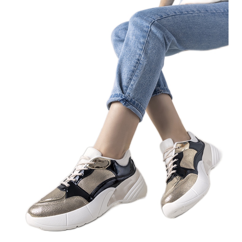 Goldene Sneakers mit hoher Sohle Rude schwarz