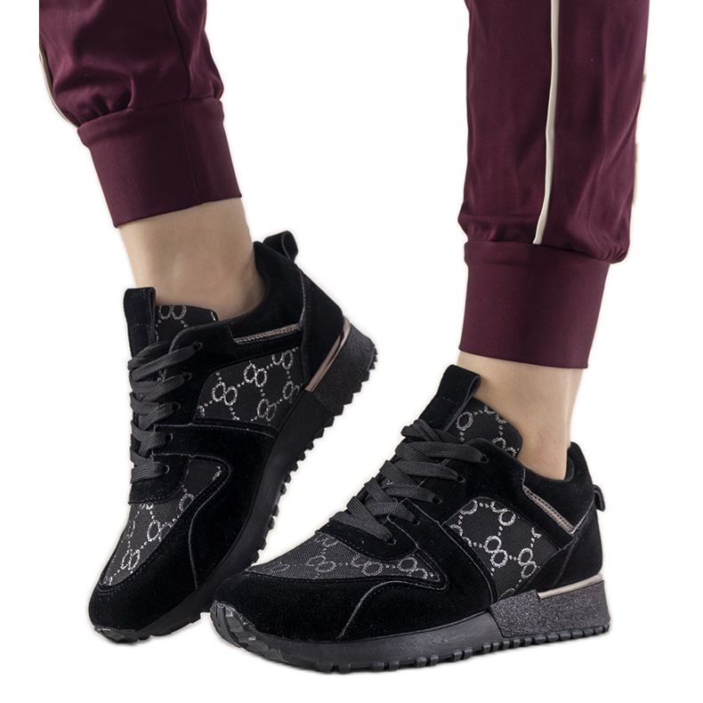 Schwarze Sneaker mit Metallic-Elementen Moves