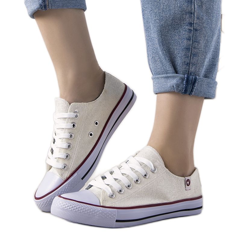 Cremefarbene glänzende Guest Sneakers beige