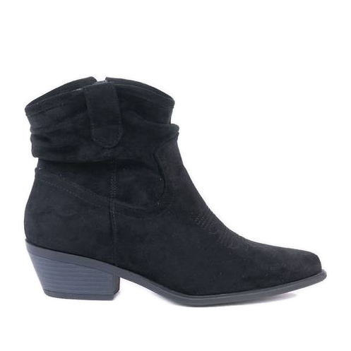 Schwarze Cowboystiefel auf dem Bowi Bowi Post