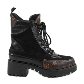 Schwarze Taschen mit braunen Einsätzen