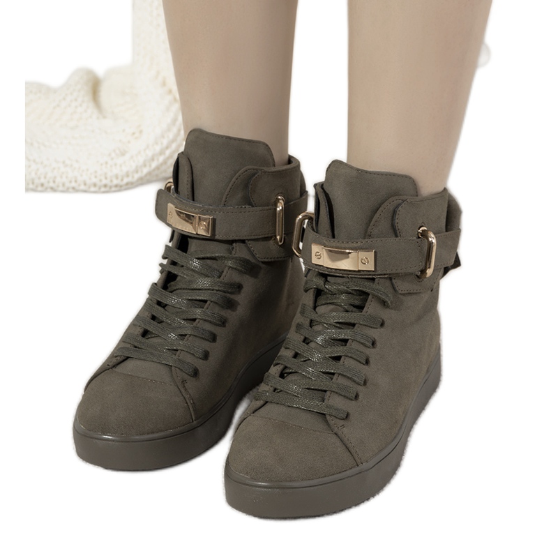 Grüne Stiefel für heidnische Damen