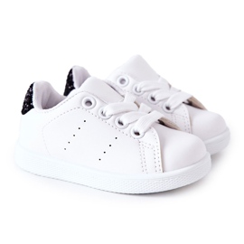 Weiße und schwarze glänzende Sneakers für Kinder