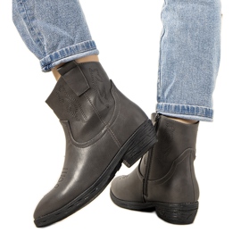 Graue isolierte Cowboystiefel Belda