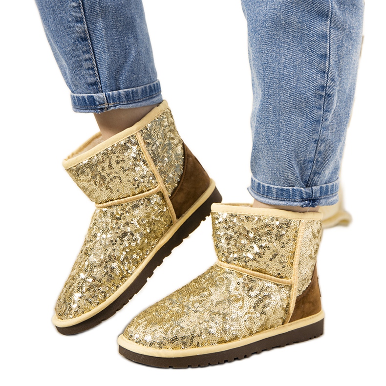 Gold isolierte Stiefel, Emu-Typ 886 golden