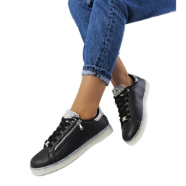 Schwarze Turnschuhe mit Caldwell-LEDs