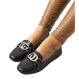 Schwarze Loafer mit goldener Theresa-Schnalle