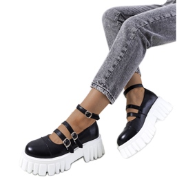 Schwarze Schuhe auf einer Traktorsohle von Jonell