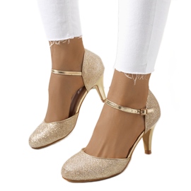 BM Goldglänzende Pumps von Rosetown golden