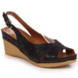 Damenledersandalen auf einem schwarzen Keil Dolce Pietro