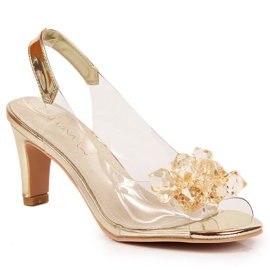 Transparente Damensandalen mit goldenen Sabatina-Steinen