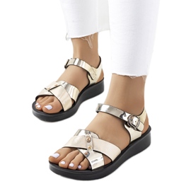 Tulia goldene Damensandalen