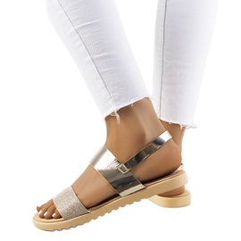 Laval goldene Damensandalen