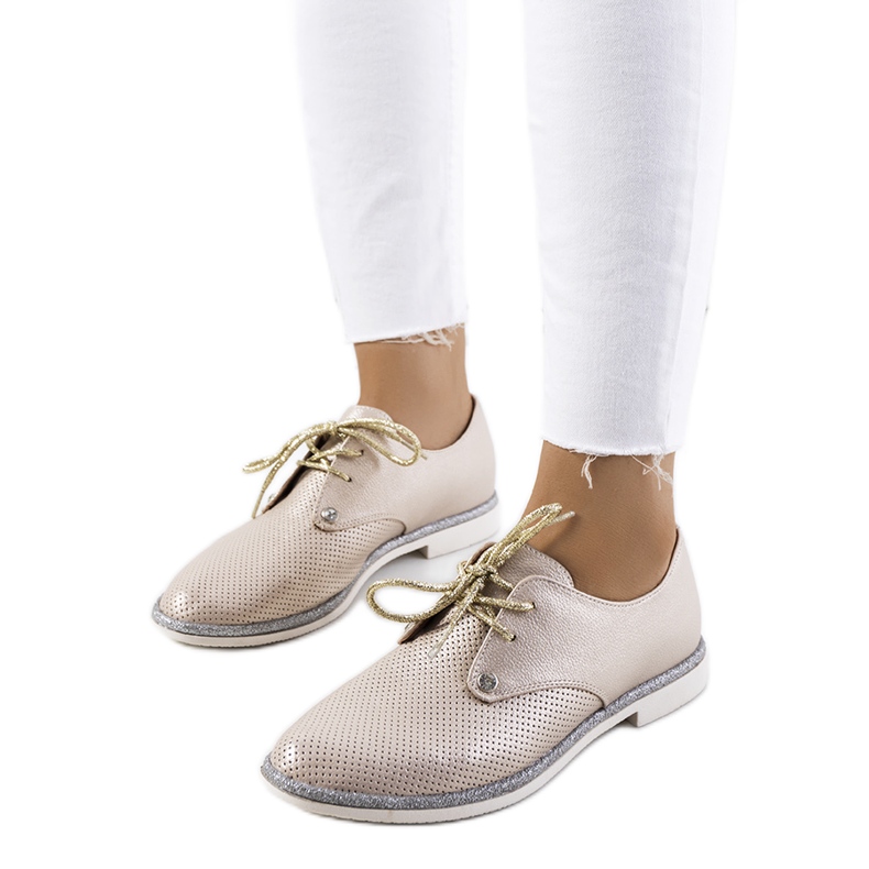 Golden glänzende Schnürschuhe von Grand Street