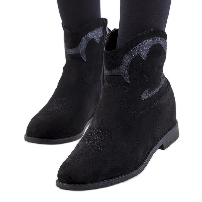 Velhas schwarze Cowboystiefel