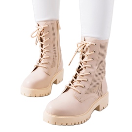 Beige Stiefel auf hoher Loop-Sohle