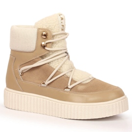 Schnürstiefel aus Leder auf einem beigen Plateau von Laura La.Fi