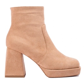 Beigefarbene Damenstiefeletten mit weitem Absatz