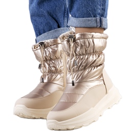 Goldene Schneestiefel mit Houle-Manschetten beige