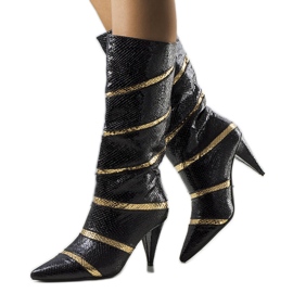 Schwarz-goldene isolierte Nevzo-Stiefel