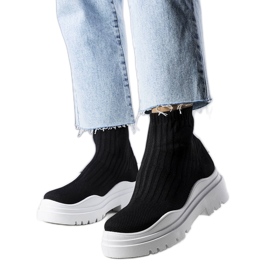 Schwarze Cali-Stiefel mit weißer Sohle