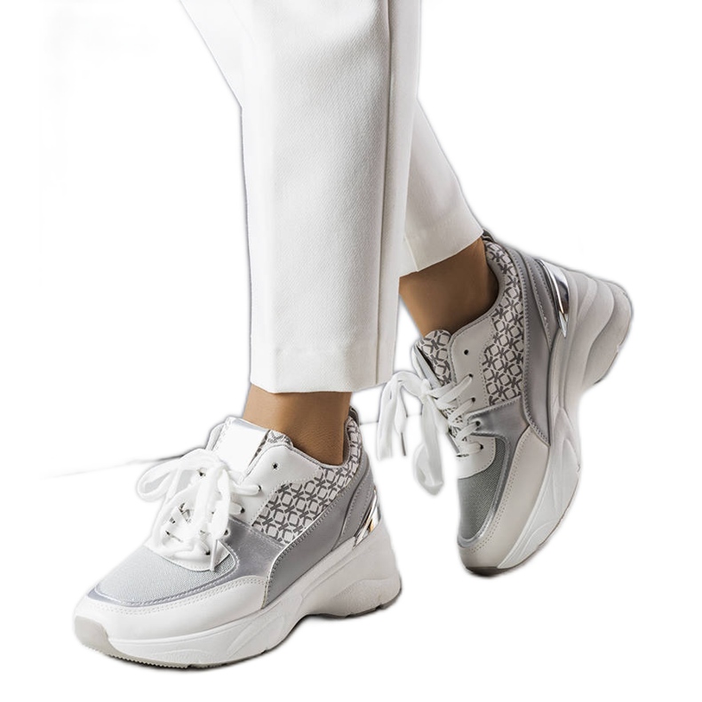 Graue Turnschuhe mit Lora-Monogramm