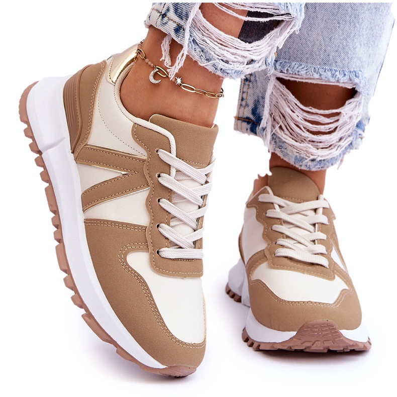 Niedrige beige Elliot-Sportschuhe der Frauen