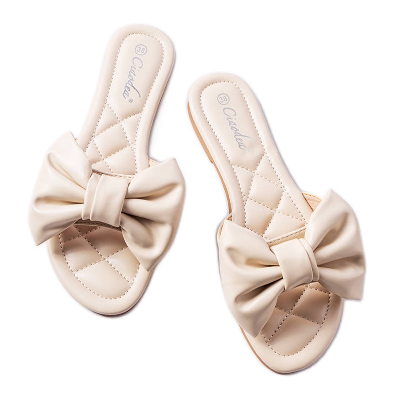 Beigefarbene elegante Sandalen mit Schleife von Garnier