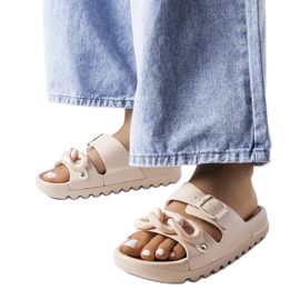 Beigefarbene Étoile-Gummipantoletten