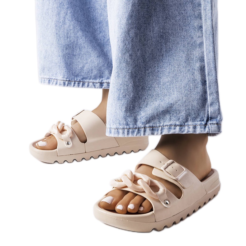 Beigefarbene Étoile-Gummipantoletten