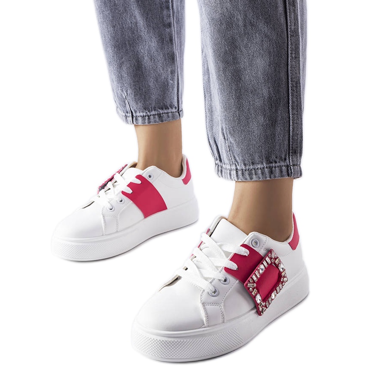 Weiße Turnschuhe mit rosafarbener Ike-Schnalle