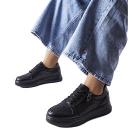 Schwarze Lederschuhe, verziert mit einem Jezzi-Reißverschluss