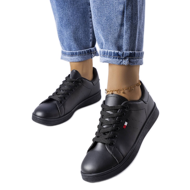 Mothé-Sneakers aus schwarzem Kunstleder