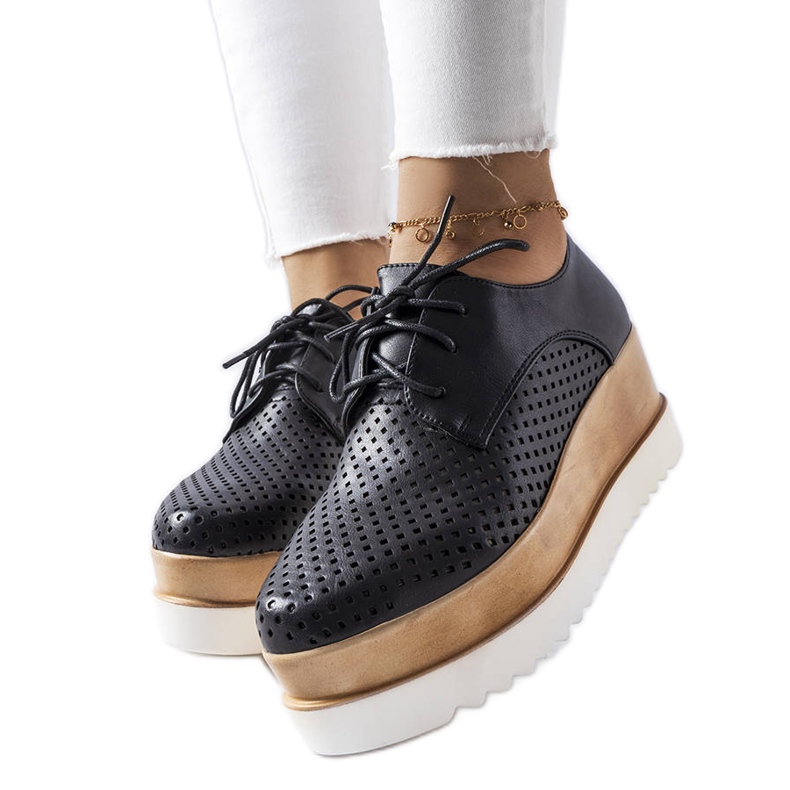 Schwarze durchbrochene Keilschuhe von Laurent