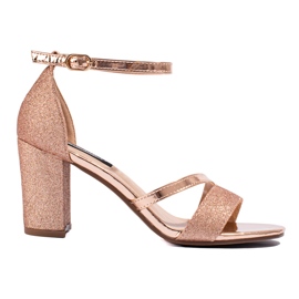 Shelovet Sandalen mit goldenem Glitzerabsatz beige